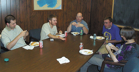 The daily card game: (from left) Jason Laux, Adam Derringer, Paul Crowder, Pete Stangel, and William Kyngesburye