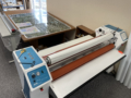 This commercial grade laminator is heat activated and laminates on both sides
